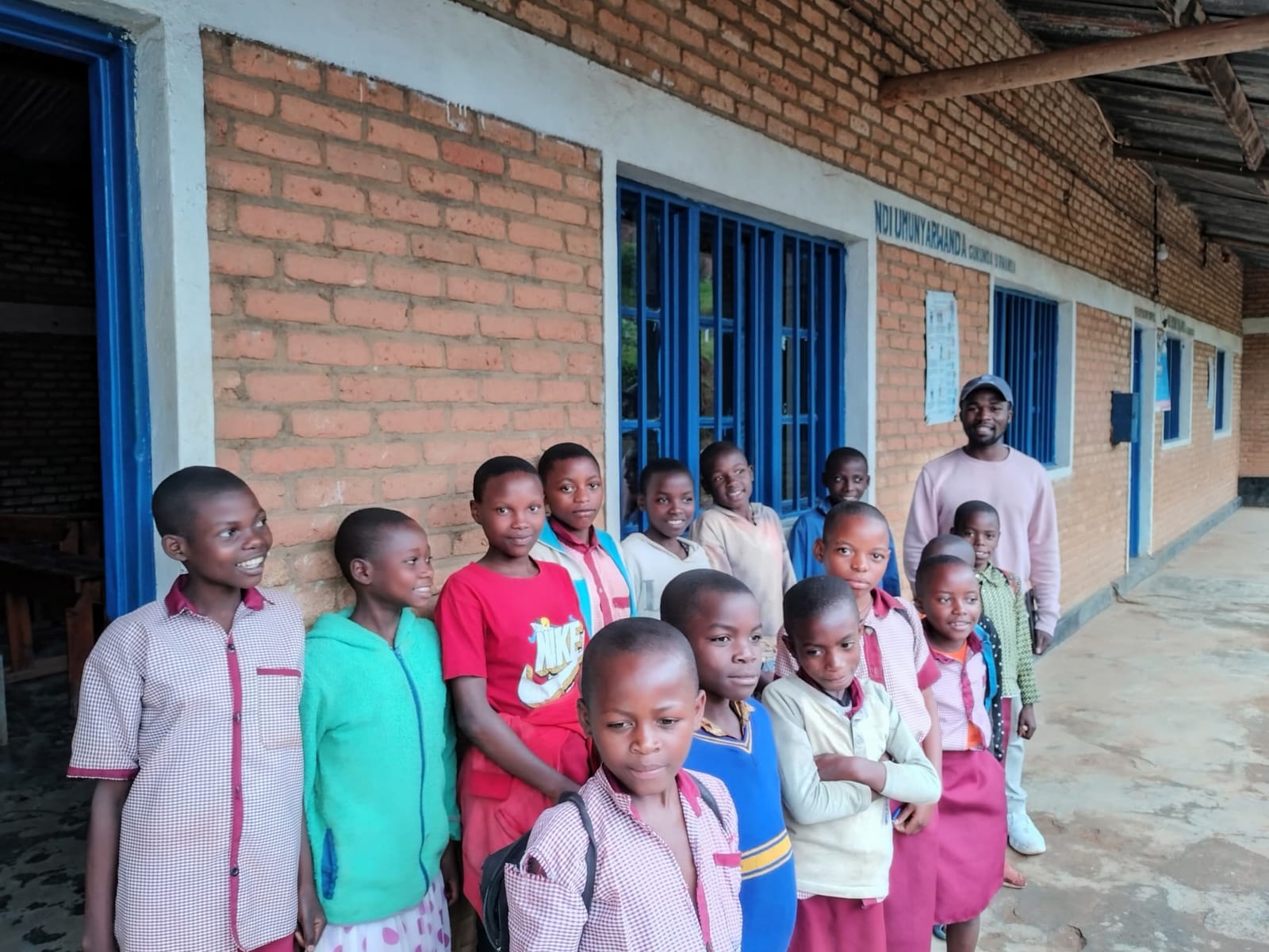 Bridge2Charity volunteers with students at EP Kirambo